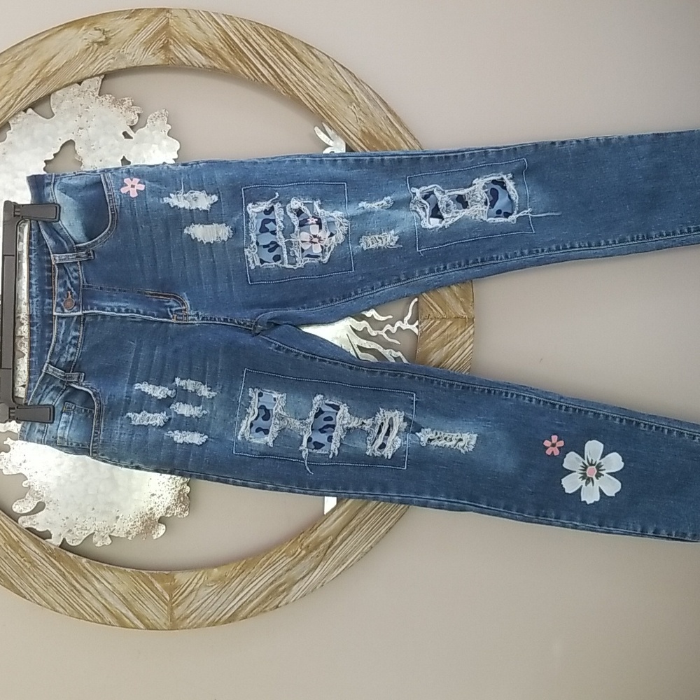 Distressed patched jeans